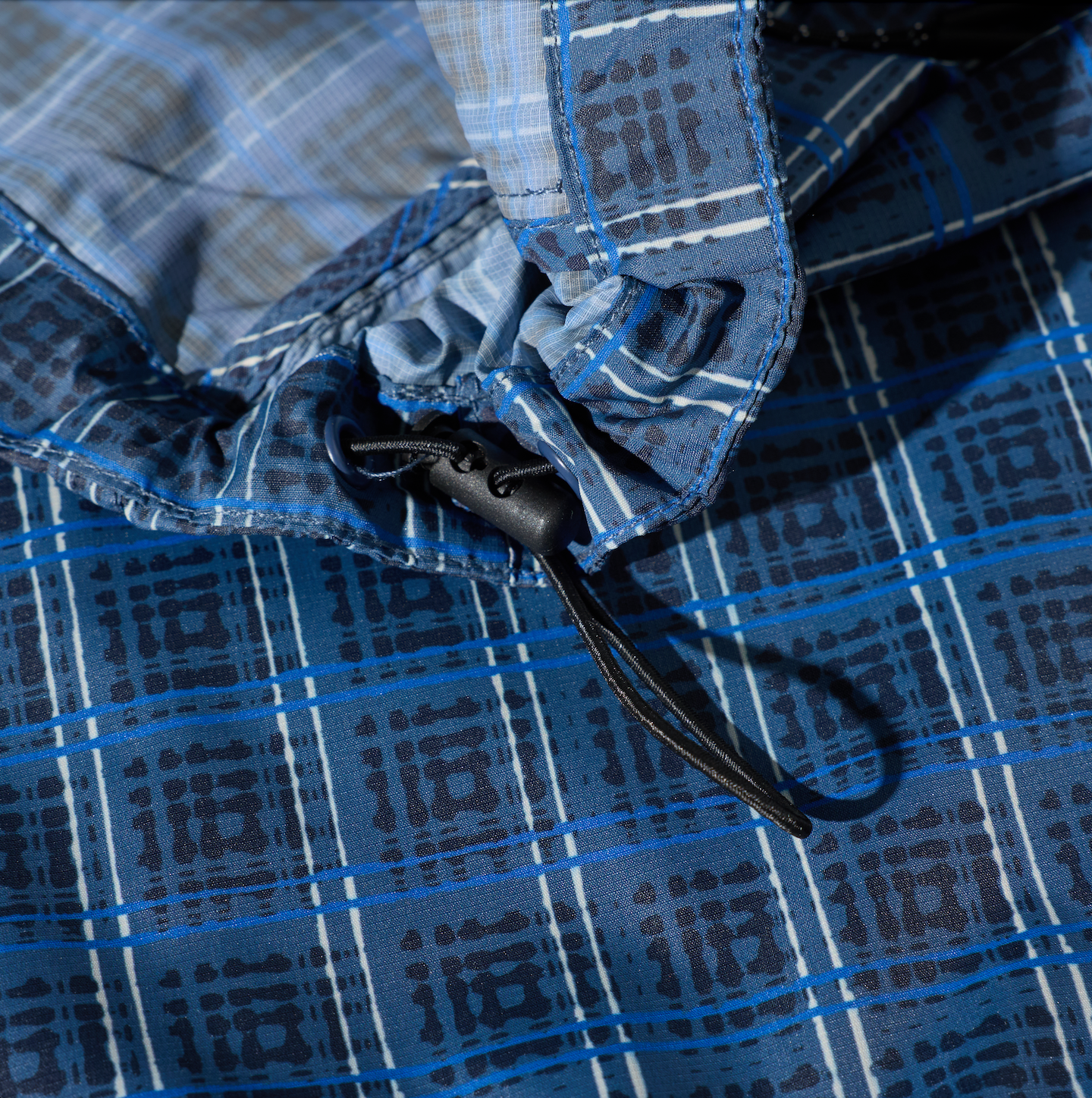 polar-skate-co-chase-light-shell-jacket-blue-check-packable-regenjacke-pu-600-80 image 6