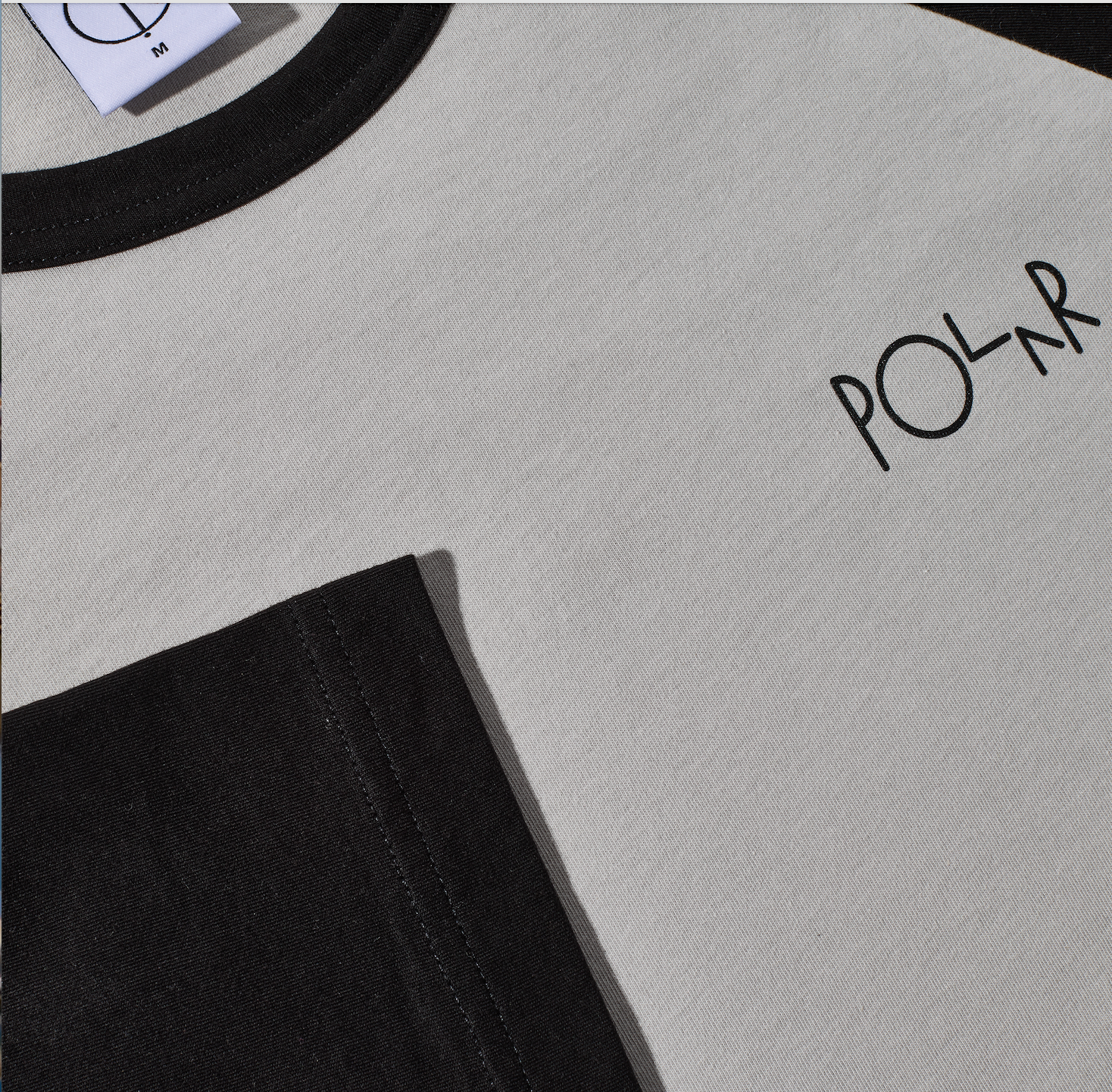 polar-skate-co-3-4-sleeve-tee-black-silver-160-gsm-raglan-shirt-mit-stroke-logo image 3