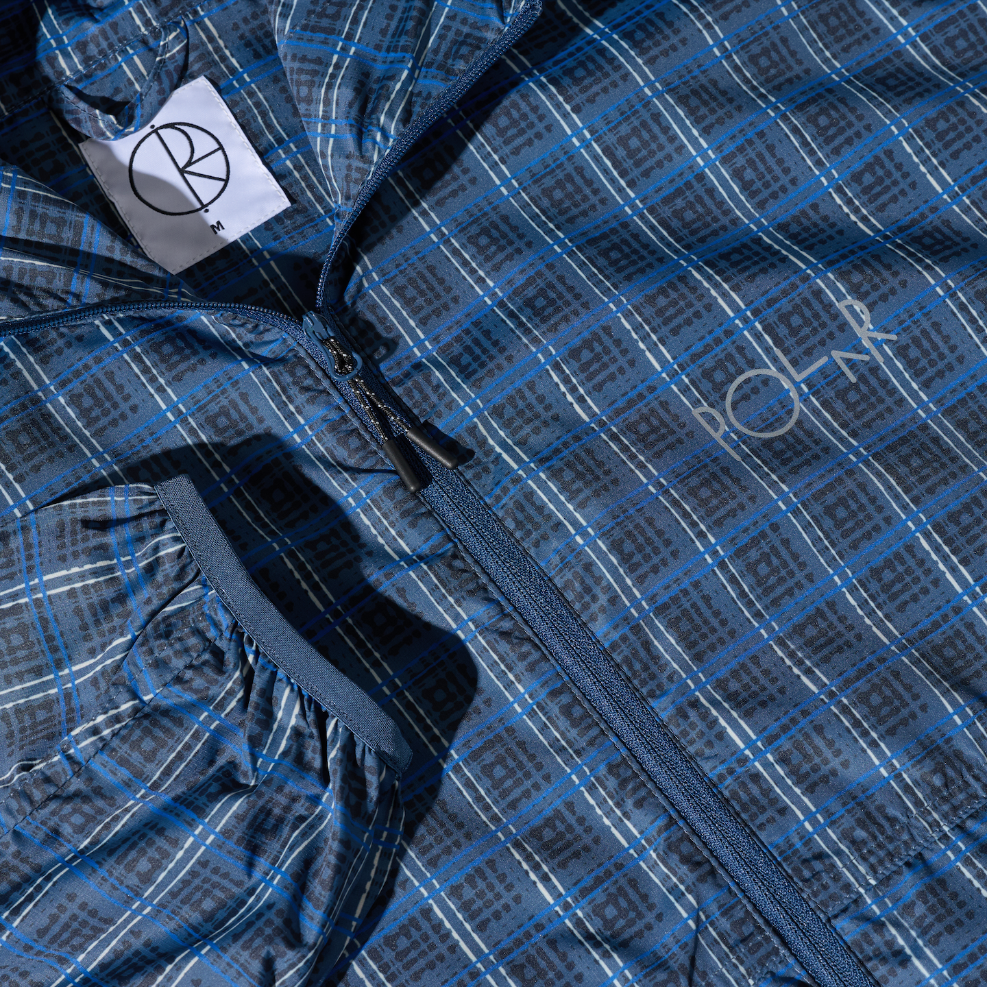 polar-skate-co-chase-light-shell-jacket-blue-check-packable-regenjacke-pu-600-80 image 5